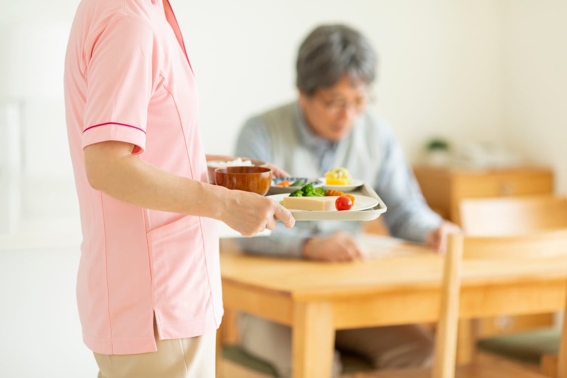 Caregiver preparing a meal